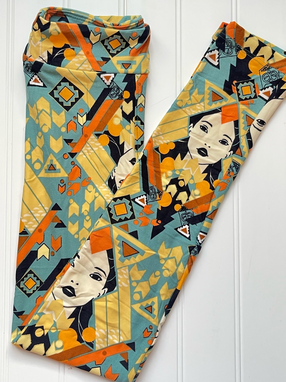 New LuLaRoe Kids Pocahontas Teal Orange & Yellow L/XL Leggings